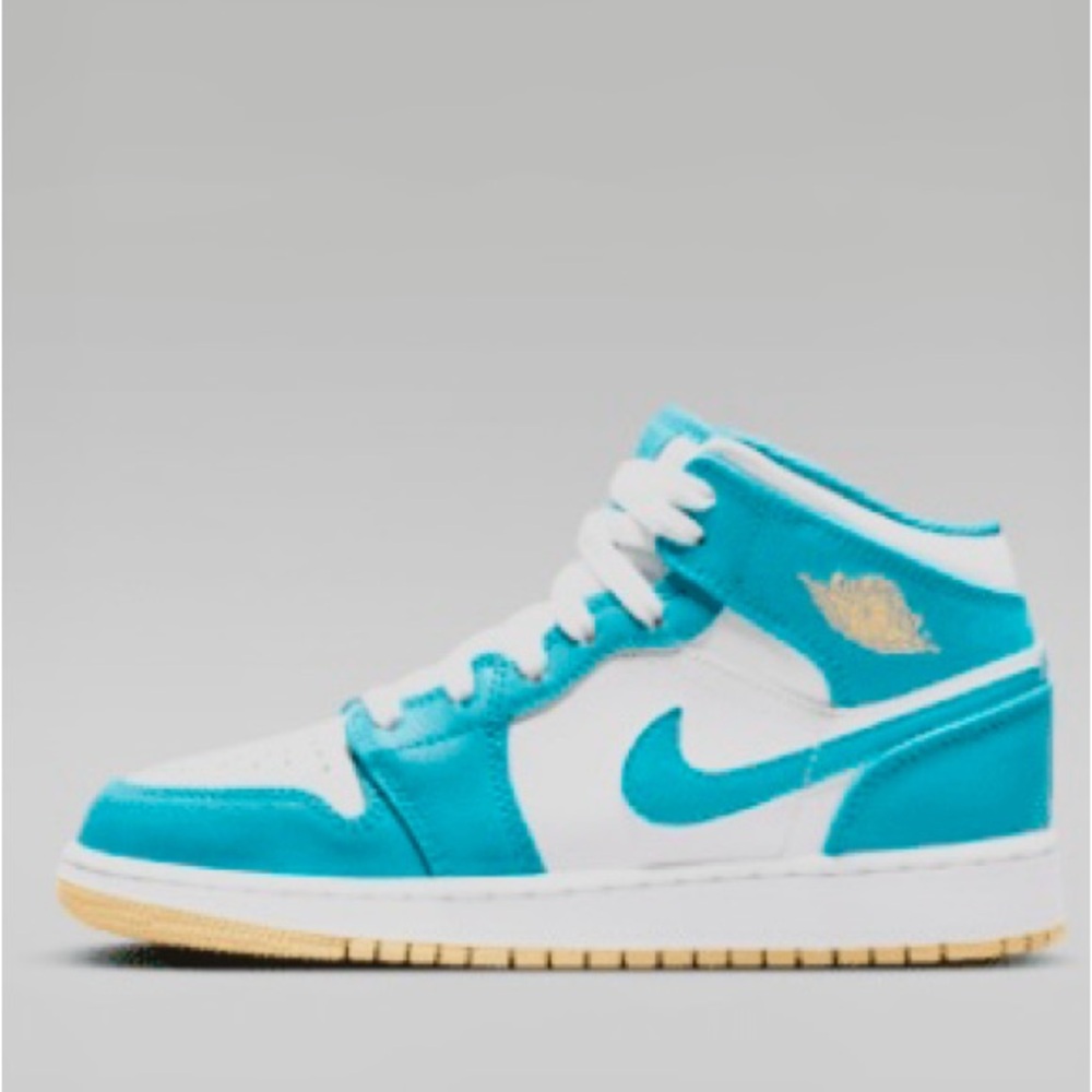 Kids Teal  and White Sneakers
Nike Jordans New in Box!